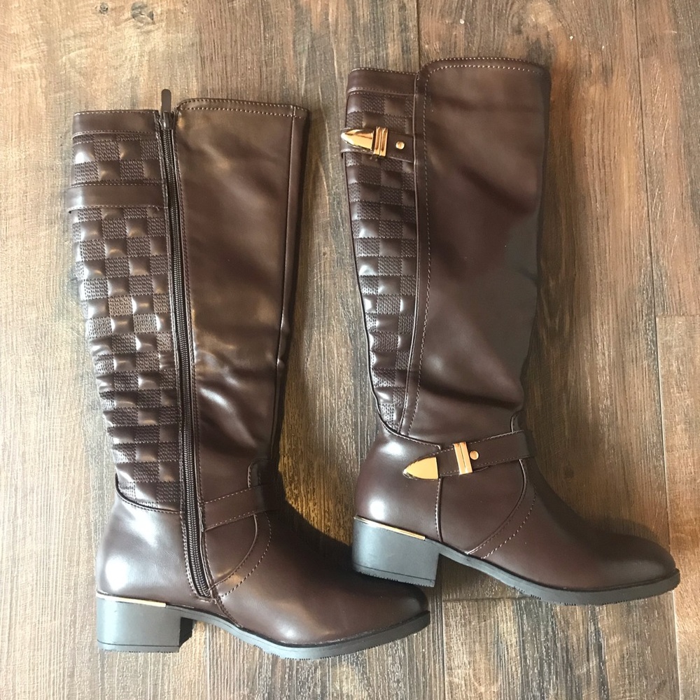Brown knee high boots with metallic accents